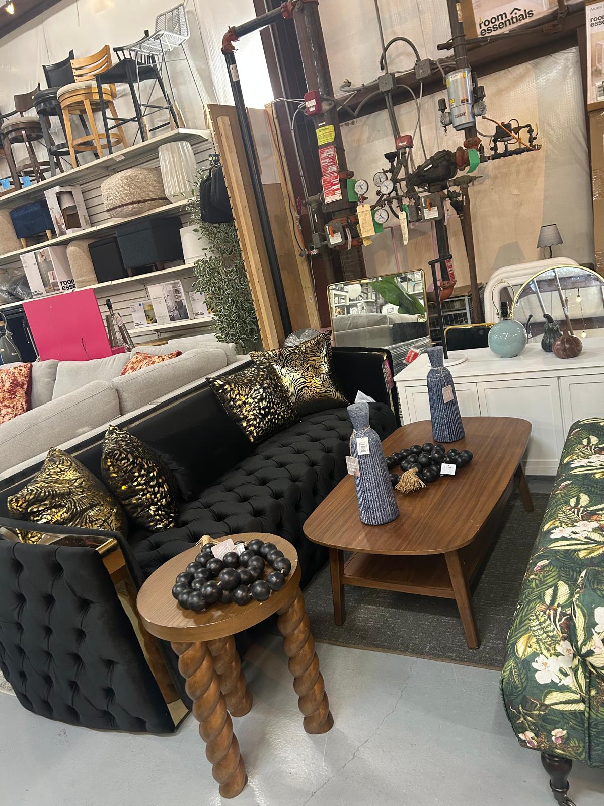 Black and gold living room display at Fast Design